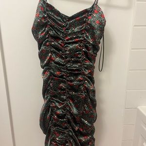 Rose print mini dress with ruching details.